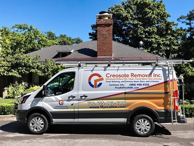 North Castle Chimney Sweep technician removing creosote safely in North Castle, NY